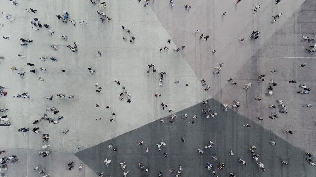 People walking in a public place.